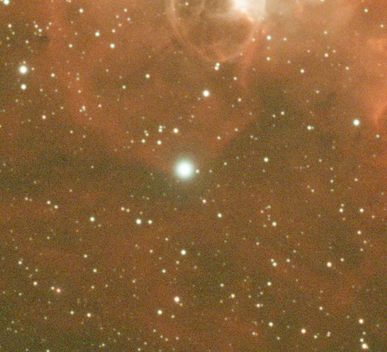 The same nebula after Halo Swatter: the green halo is gone, the nebula behind it is intact